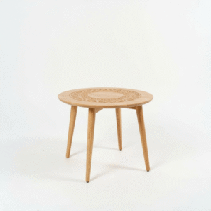 handcrafted wooden coffee table with three legs | intricately carved top | antique finish living room table